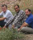 iran, tourist with his guide & driver in abyaneh nature
