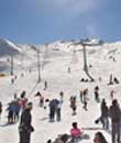 iran, people skiing in dizin ski resort
